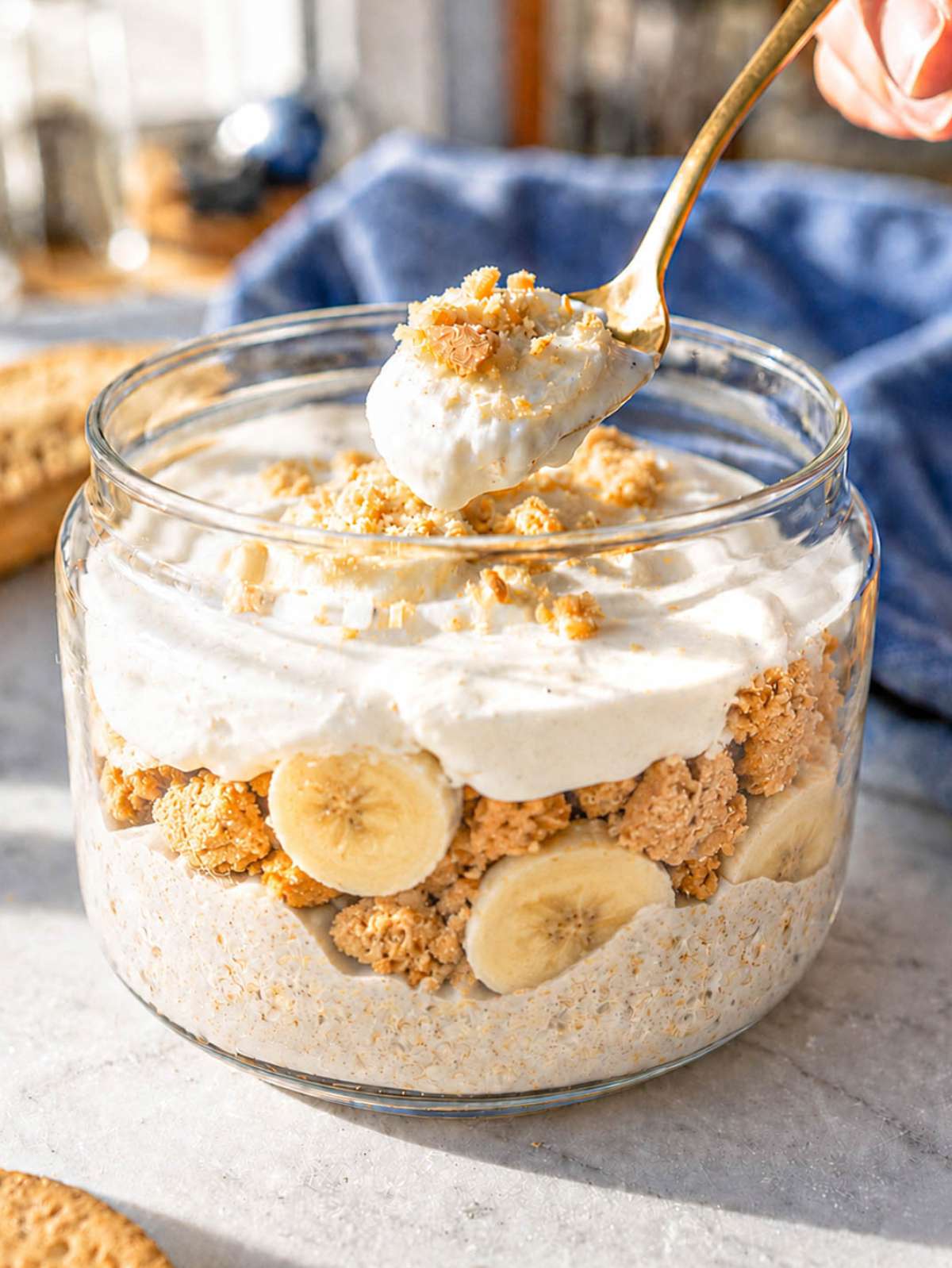 Spoonful of creamy banana pudding overnight oats.