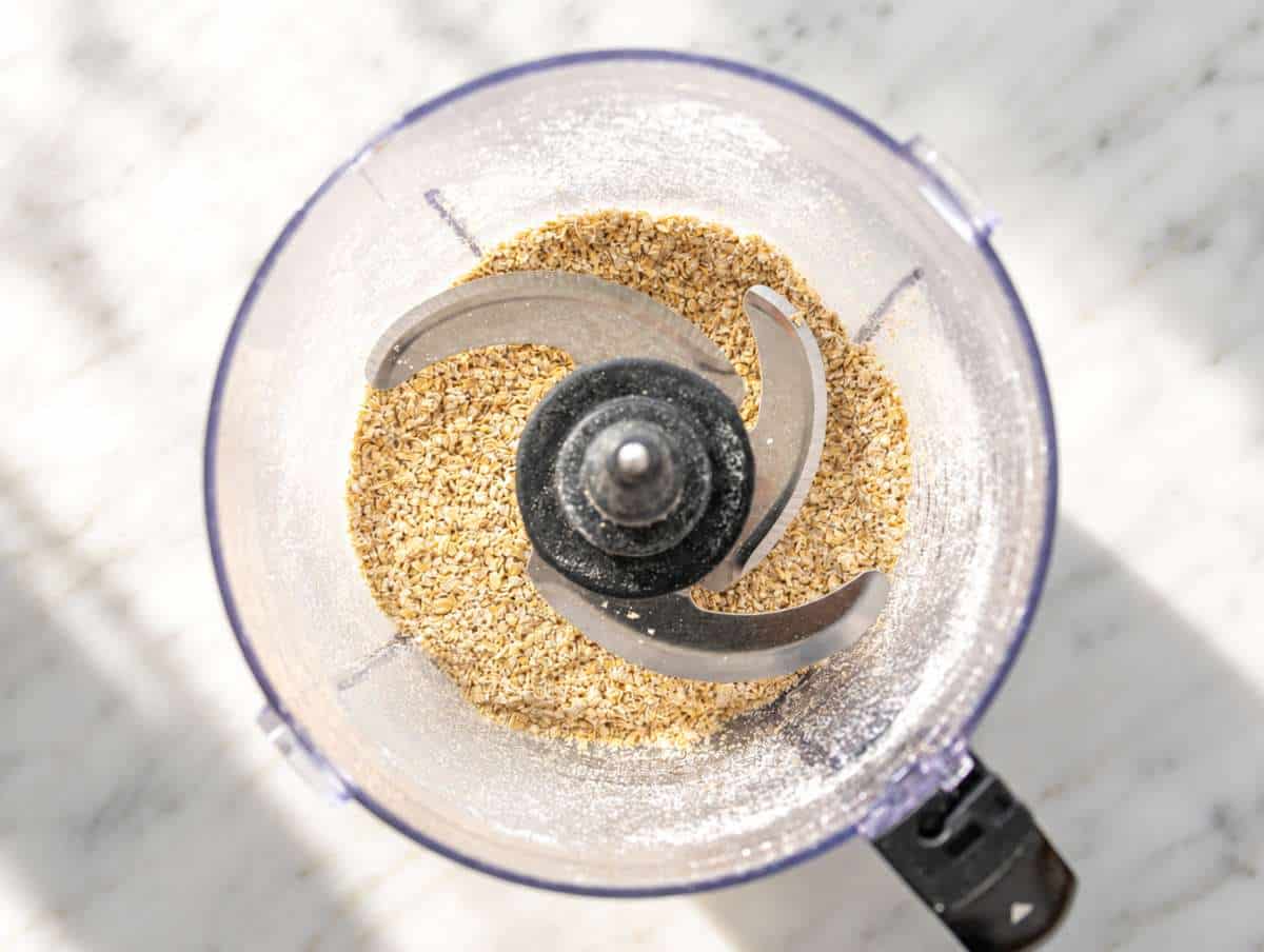 Step 1 Blending rolled oats into a coarse flour in a food processor.