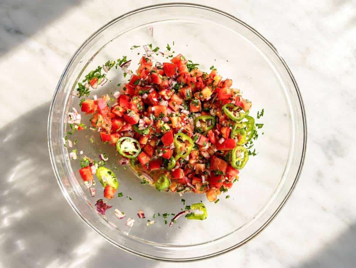 Step 1 Chopped tomatoes, onion, cilantro, and jalapeño.