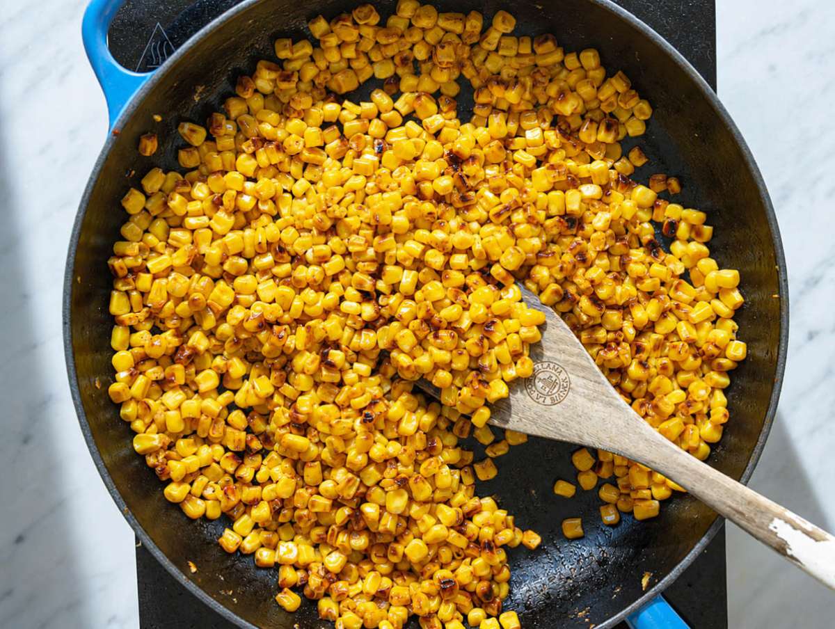 Step 1 Corn kernels charring in a skillet with smoked paprika.