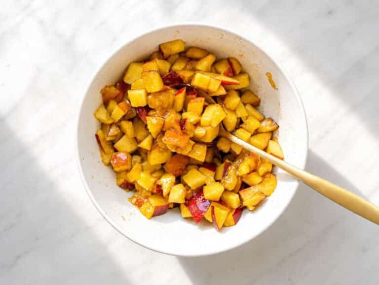 Step 1 Diced peaches tossed with cinnamon in a small bowl.