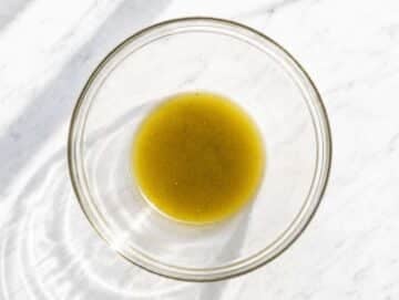 Step 1 Lime dressing whisked together with olive oil, honey, and cumin.