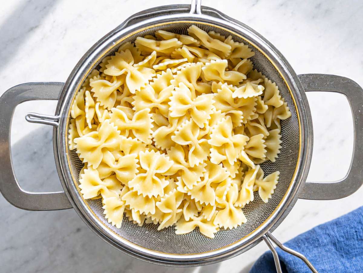 Step 1 Rotini pasta cooked in a large pot.