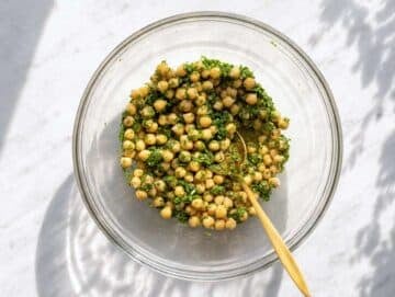 Step 2 Chickpeas tossed in chimichurri dressing in a bowl.