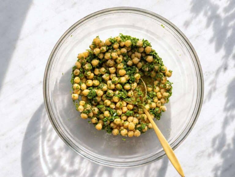 Step 2 Chickpeas tossed in chimichurri dressing in a bowl.