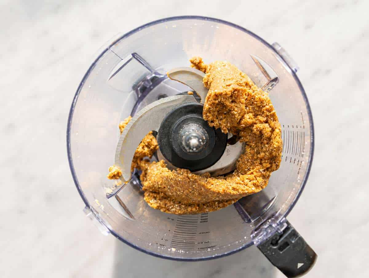 Step 2 Mixing ingredients into soft cookie dough energy balls mixture.