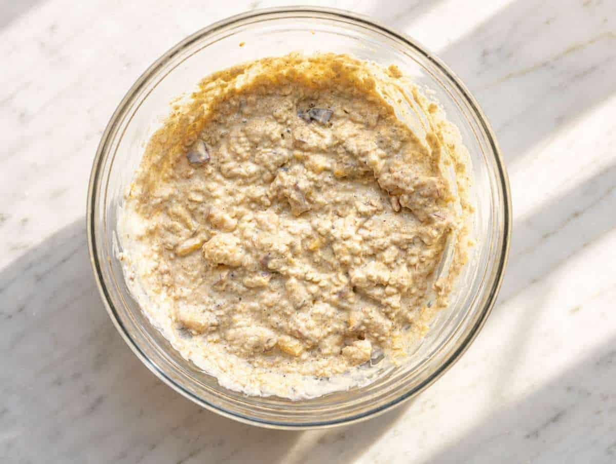Step 2 Oats, yogurt, milk, and cinnamon mixed in bowl.