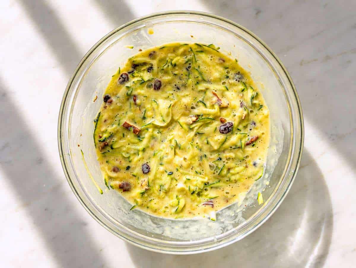 Step 2 Zucchini, raisins, and walnuts stirred into batter.