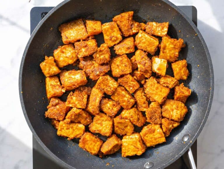 Step 3 Crispy fried tofu cooking in nonstick skillet.