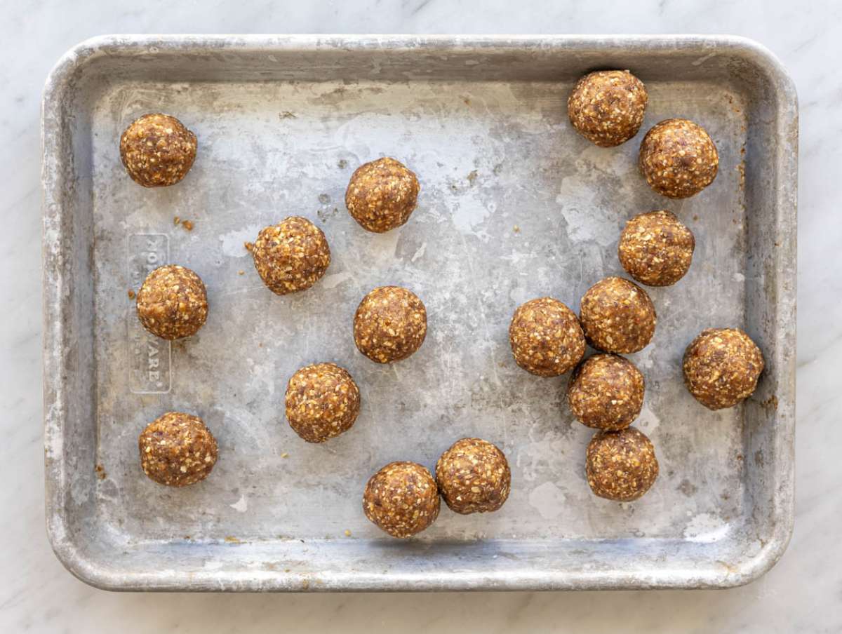 Step 3 Rolled energy balls on silver tray.