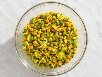 Step 3 Salad gently tossed until evenly coated with turmeric dressing.