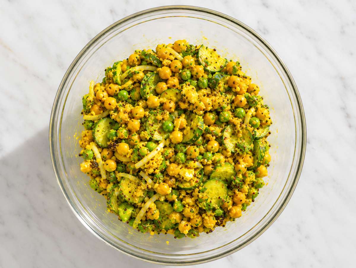 Step 3 Salad gently tossed until evenly coated with turmeric dressing.