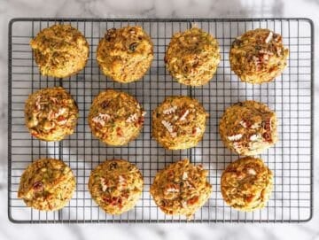 Step 4 Freshly baked zucchini muffins cooling on rack.