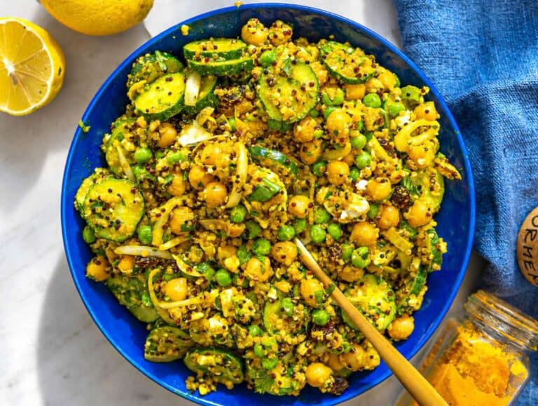 Step 4 Turmeric chickpea quinoa salad with cucumber, peas, feta, and lemon dressing.