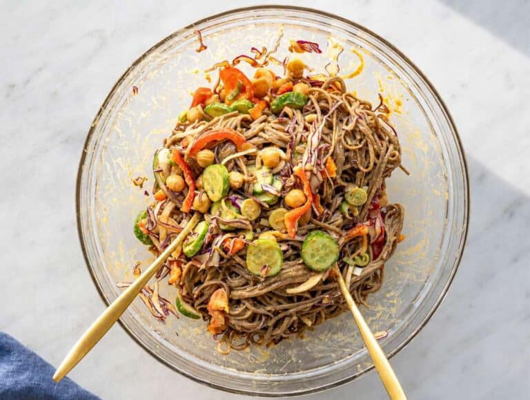 Step 4 Vegetables and chickpeas mixed into dressed soba noodles.