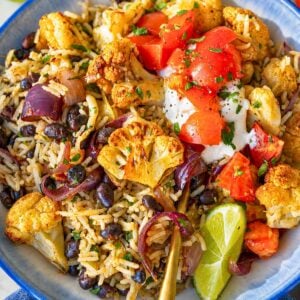 Cauliflower Burrito Bowl served warm with lime, herbs, and melted cheese.