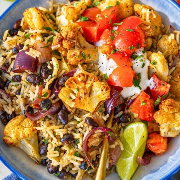 Cauliflower Burrito Bowl served warm with lime, herbs, and melted cheese.