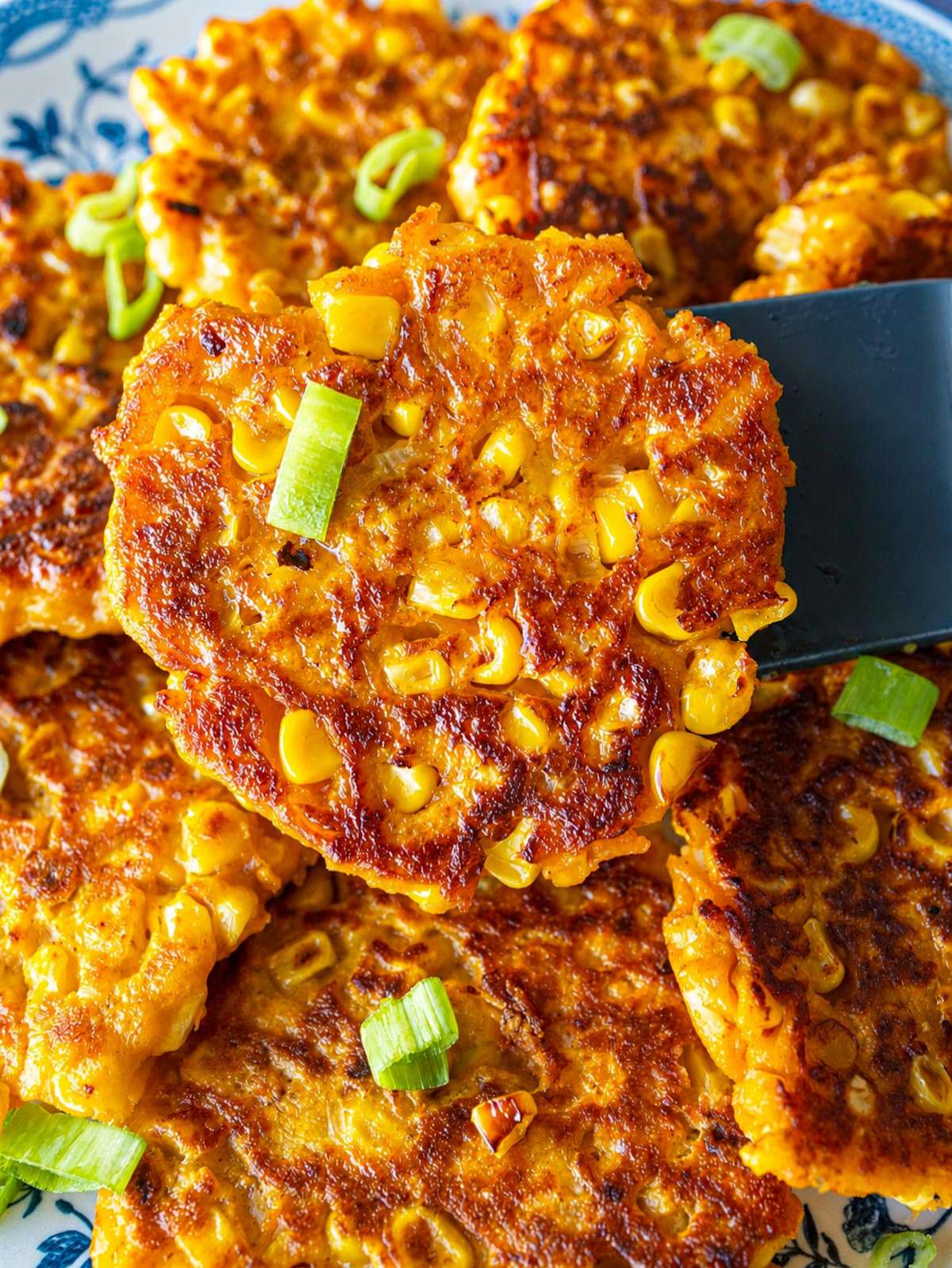 Close-up of crispy sweet potato corn patty with crispy exterior.