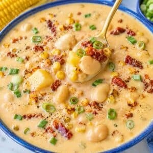 Healthy corn chowder topped with sun-dried tomatoes, green onions, and cracked pepper.