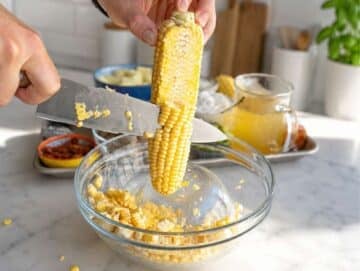 Step 1 Fresh corn kernels sliced from cobs into a large bowl.
