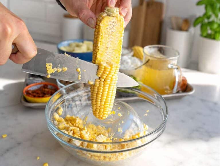 Step 1 Fresh corn kernels sliced from cobs into a large bowl.