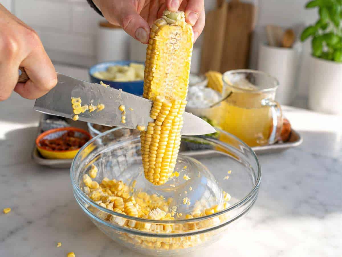 Step 1 Fresh corn kernels sliced from cobs into a large bowl.