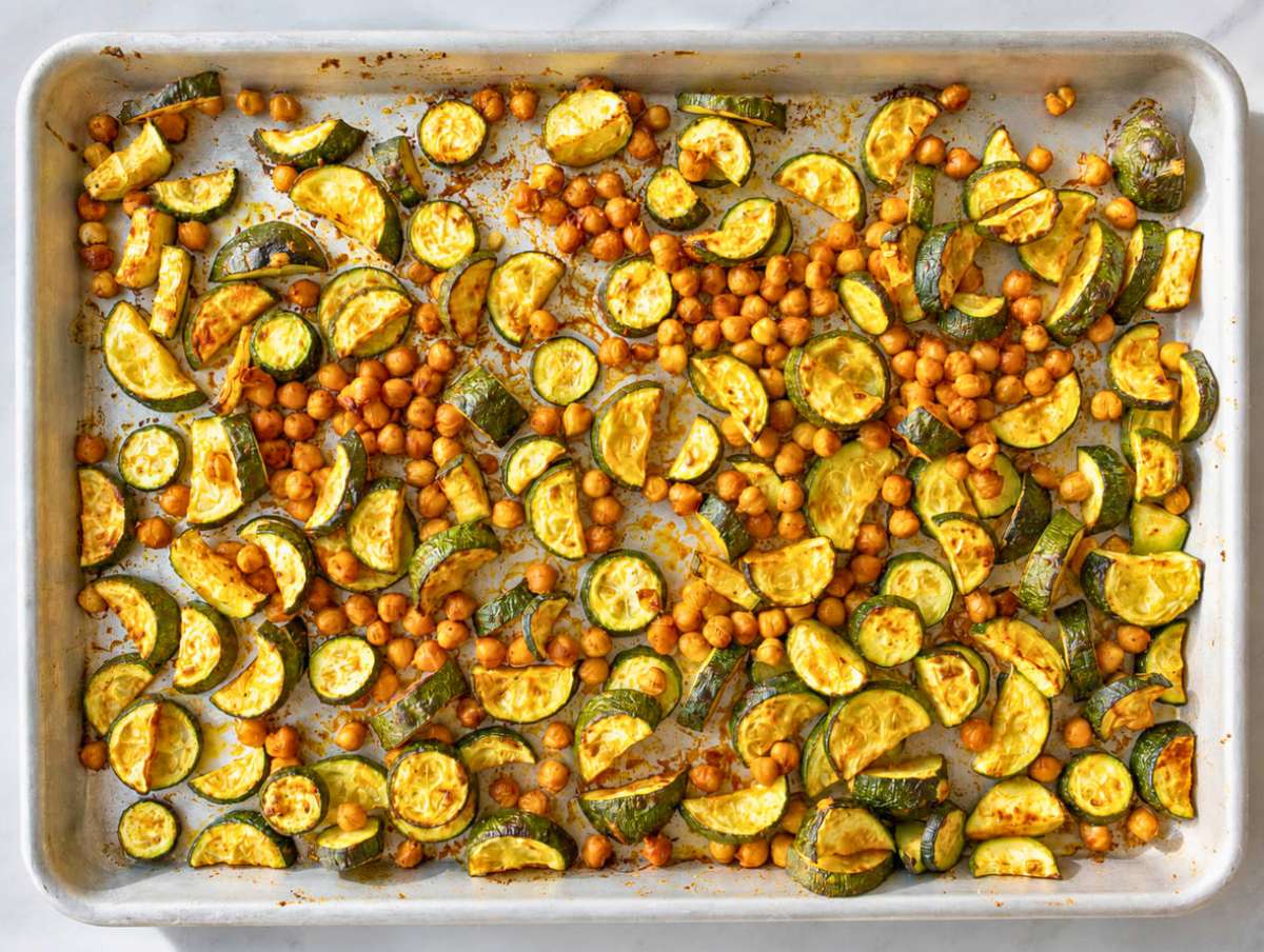 Step 1 Roasted zucchini and chickpeas browned and caramelized after baking on sheet pan.