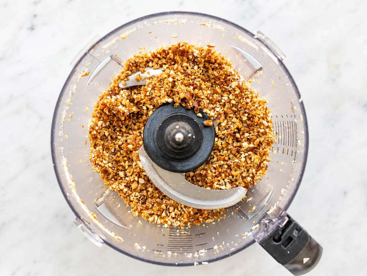 Step 2 Blended mixture with coarse, crumbly texture inside food processor bowl.
