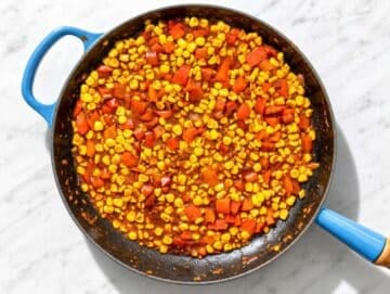 Step 2 Corn charring with smoked paprika, thyme, and seasonings in the skillet.