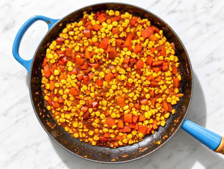 Step 2 Corn charring with smoked paprika, thyme, and seasonings in the skillet.