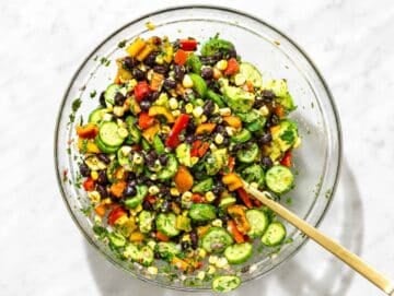 Step 2 Corn, cucumber, peppers, and onion tossed with marinated black beans.