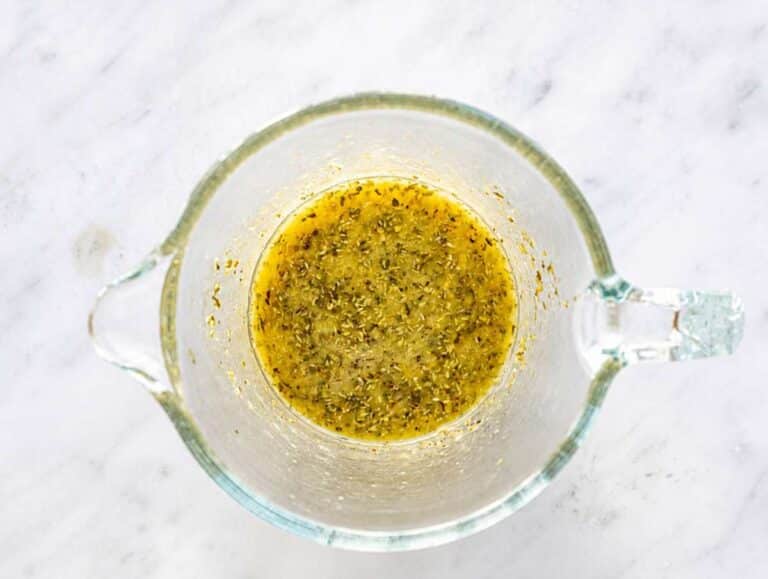 Step 2 Lime dressing with dried herbs on marble surface.