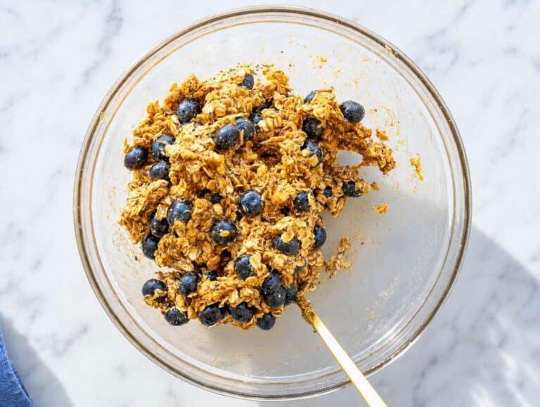 Step 2 Mixing oats, walnuts, chia seeds, blueberries, and remaining ingredients into dough.