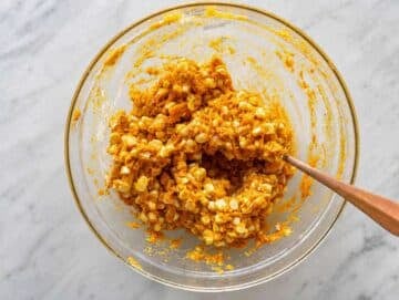 Step 2 Mixing sweet potato, corn, Parmesan, egg, flour, and spices together.