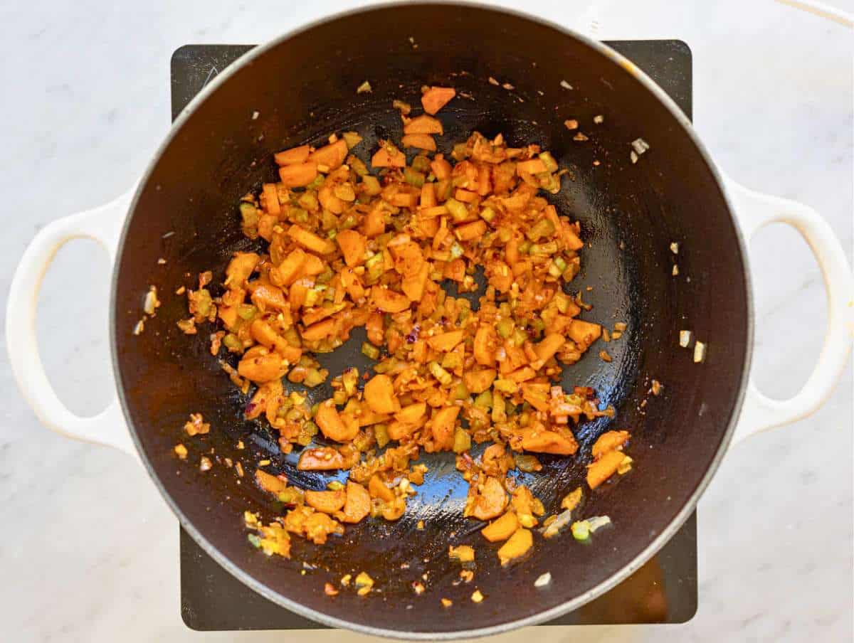 Step 2 Onion, carrots, celery, and spices cooking in olive oil.