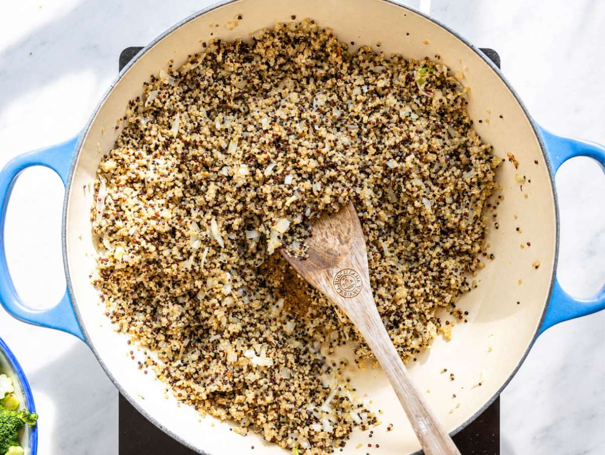 Step 2 Onion, garlic, and quinoa toasting together until fragrant and lightly golden.