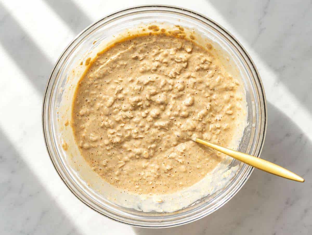 Step 2 Rolled oats stirred into peanut butter mixture before filling the baking dish.
