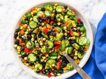 Step 3 Avocado folded into finished salad before serving in bright natural daylight.