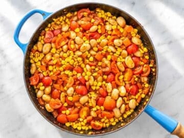 Step 3 Butter beans and tomatoes simmering in a lightly saucy vegetable broth.
