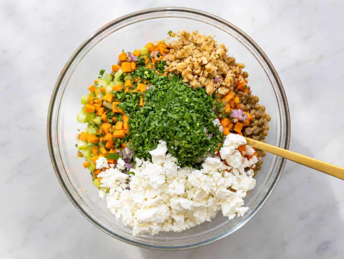 Step 3 Chopped vegetables, feta, parsley, and walnuts added to marinated lentils.