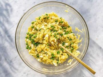 Step 3 Hot orzo tossed with creamy lemon feta dressing until evenly coated.