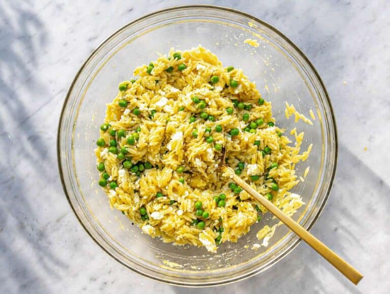 Step 3 Hot orzo tossed with creamy lemon feta dressing until evenly coated.