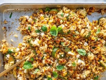Step 3 Hot orzo tossed with roasted vegetables, feta, basil, and lime dressing.