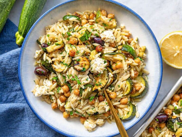 Step 4 Roasted zucchini orzo finished with parsley, feta, and fresh lemon before serving.