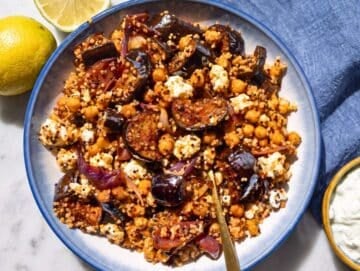 Step 5 Roasted Eggplant Gyros Bowl served warm with tzatziki and fresh lemon wedges.