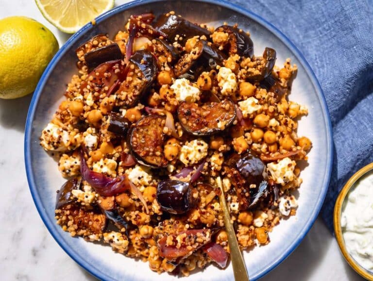 Step 5 Roasted Eggplant Gyros Bowl served warm with tzatziki and fresh lemon wedges.