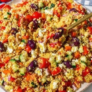 Fresh Greek couscous salad with colorful vegetables