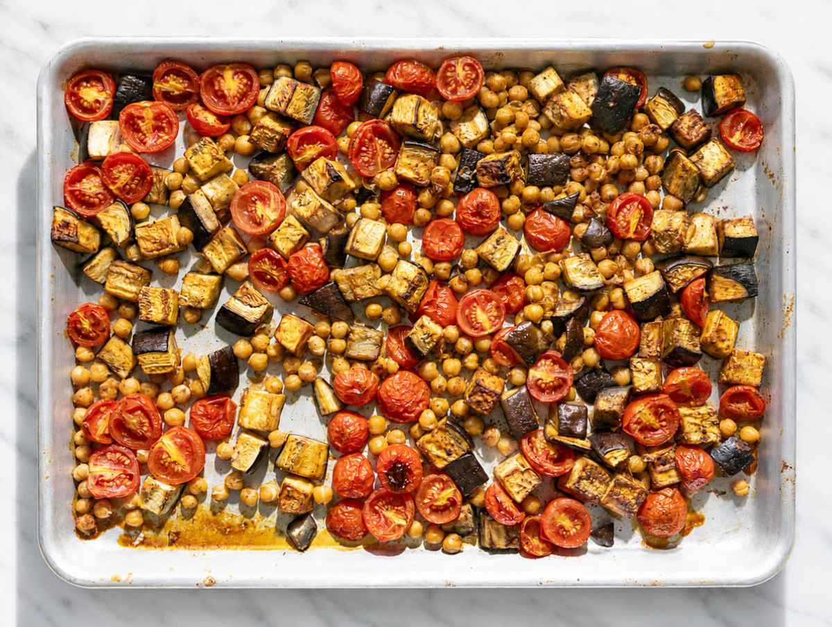 Step 1 Eggplant, tomatoes, and chickpeas roasted until caramelized and jammy.