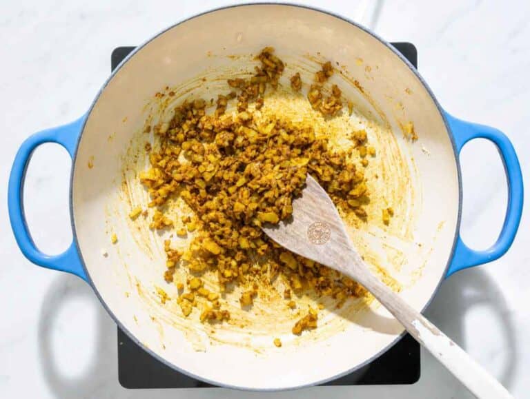 Step 1 Onion, garlic, ginger, and spices cooking in olive oil until fragrant.