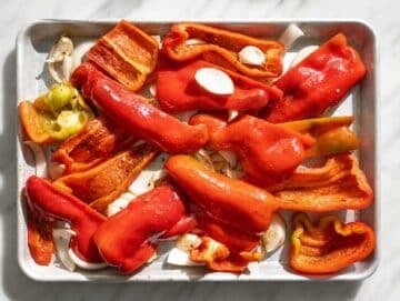 Step 1 Red peppers, onion, and garlic roasting with olive oil and spices.
